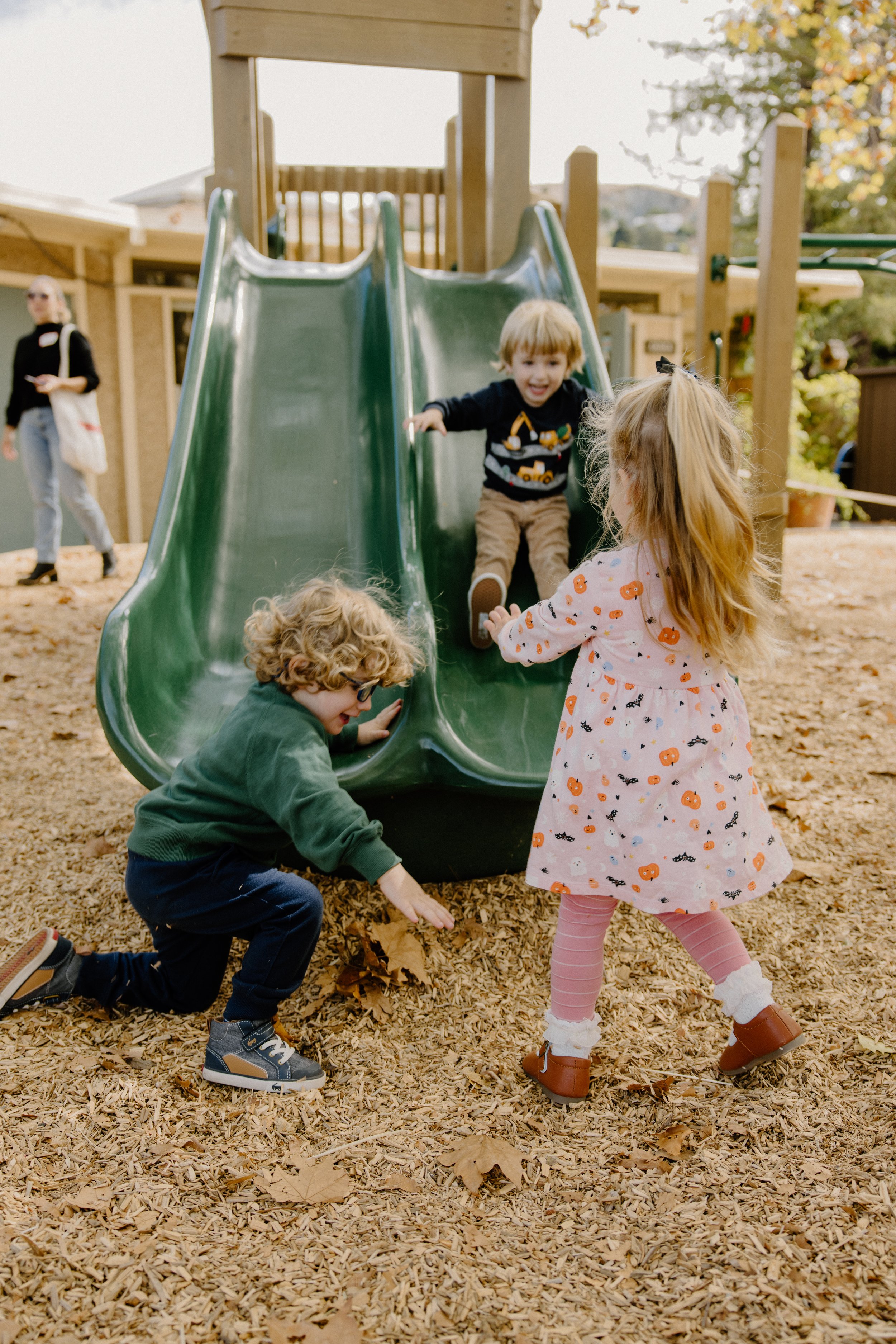 Children playing outdoors in nature at Marin Mountain School in Corte Madera